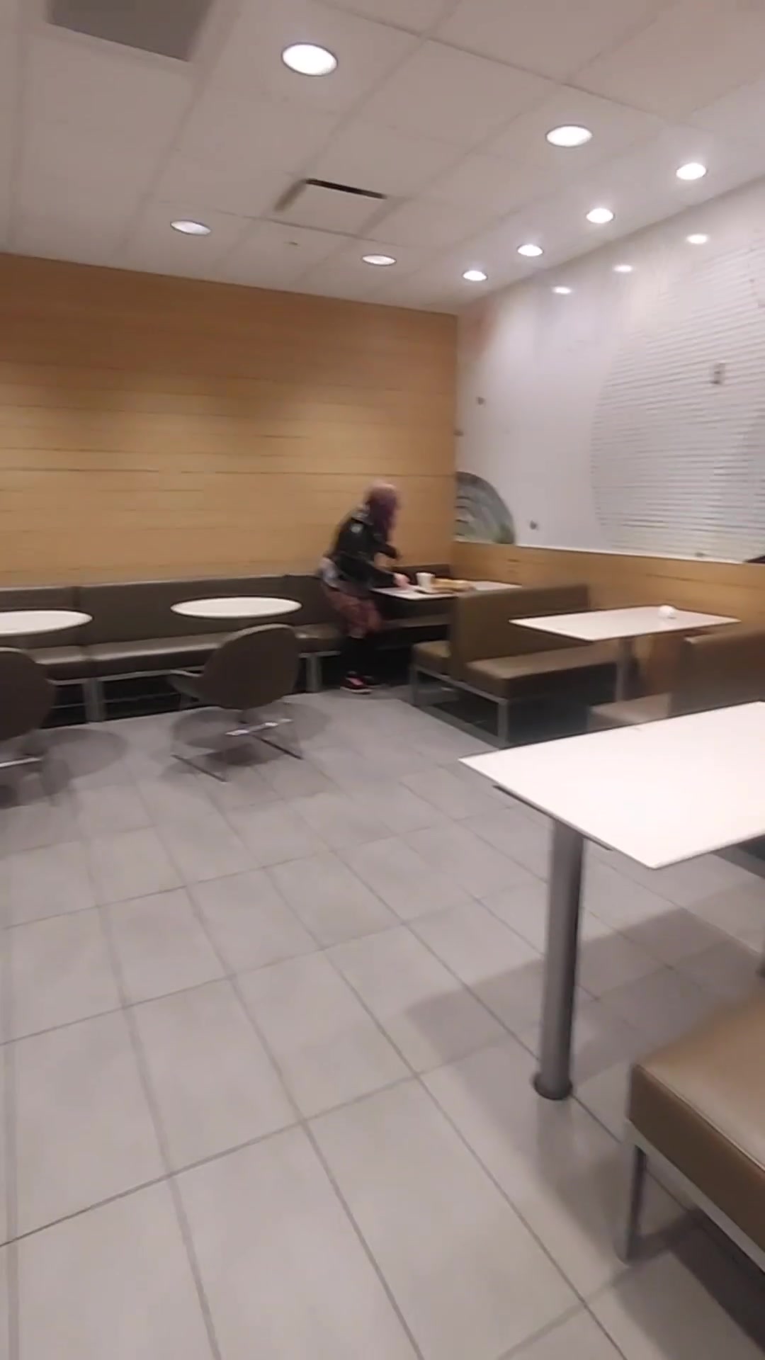 Milf rubs pussy before eating burger