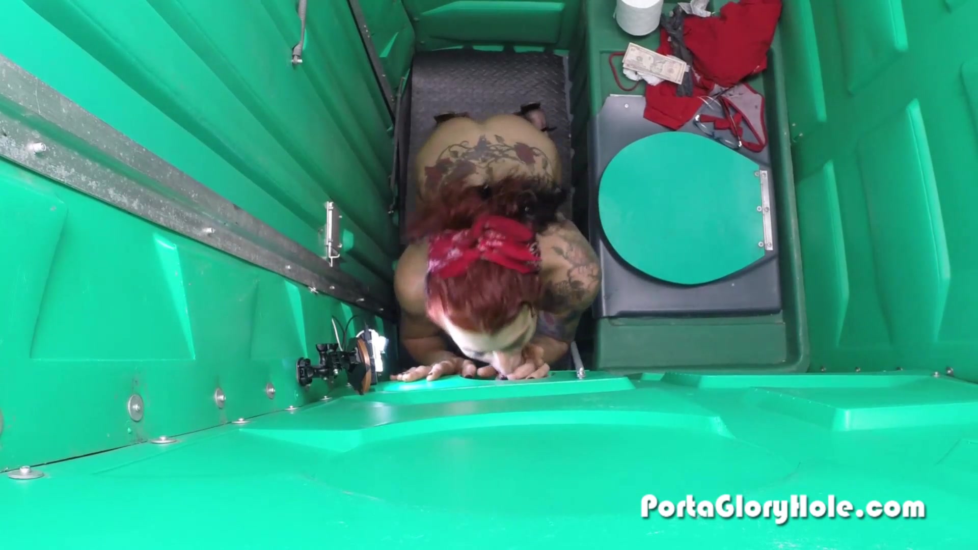 Porta Gloryhole Mature Redhead slurping cocks